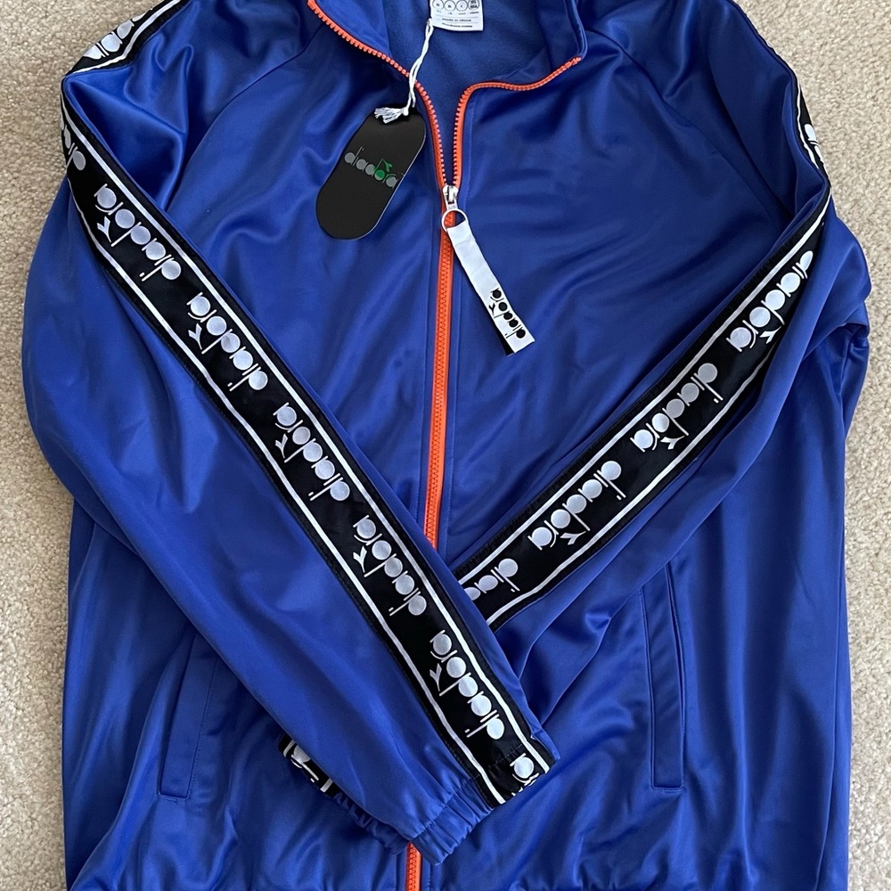 Diadora track jacket. Blue with orange zipper.